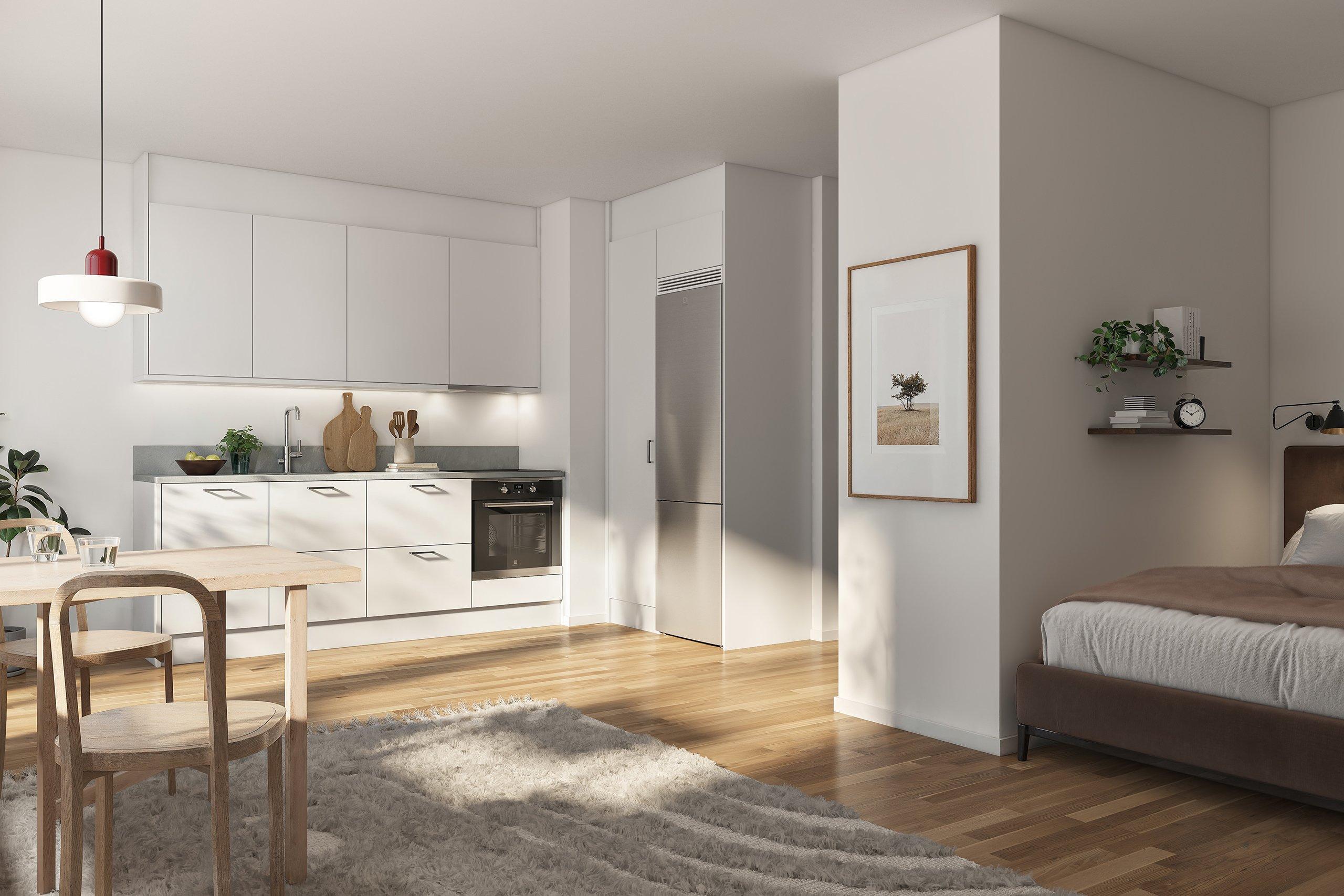 Köket är välplanerat med tidlösa materialval med bänkskiva i grå laminat som fortsätter upp på väggen i form av en bakkantslist och släta luckor. Vitvarorna är helintegrerade för ett stilrent uttryck (visionsbild).