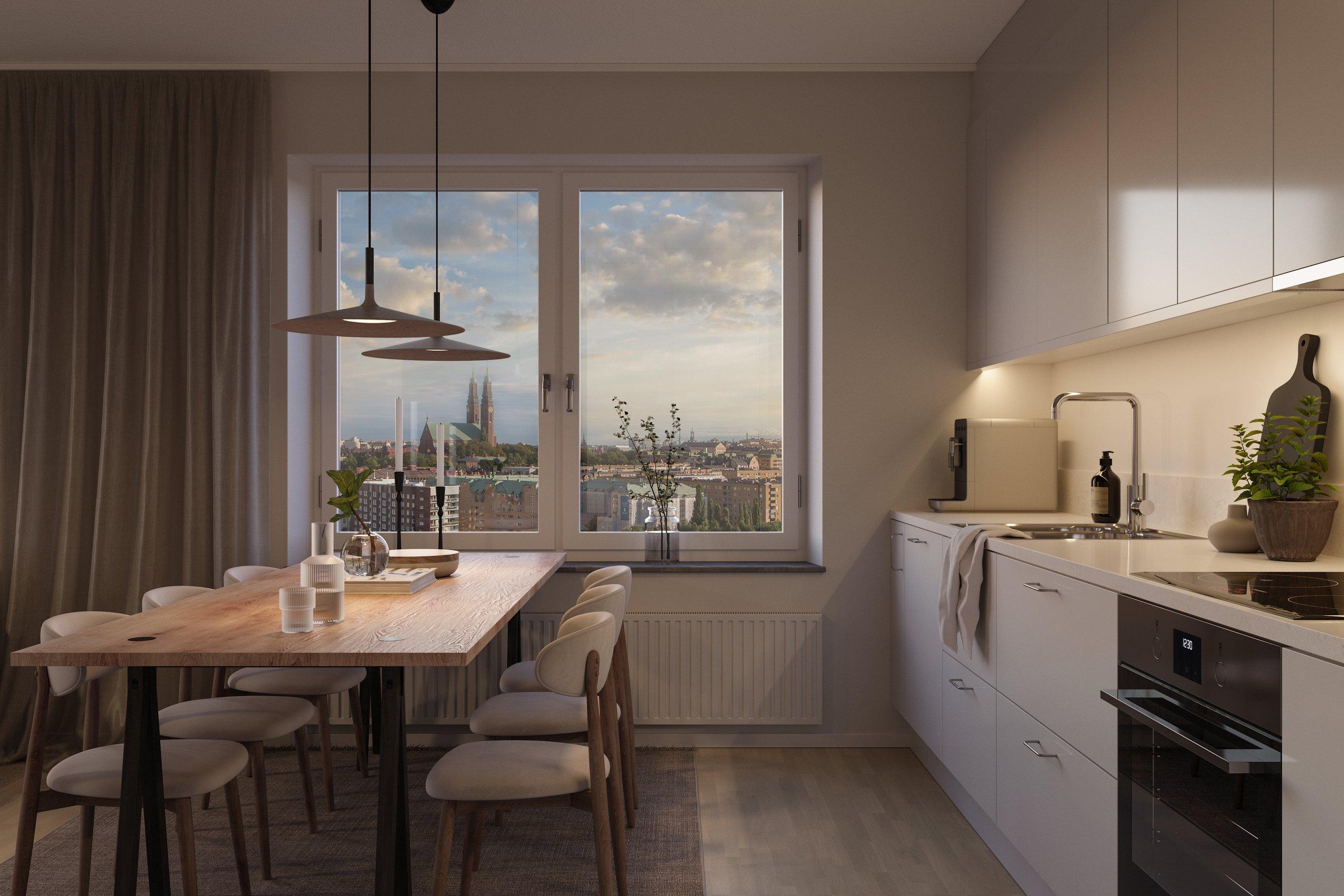 Välutrustat kök med härlig utsikt över Södermalm och Årstaviken (visionsbild).