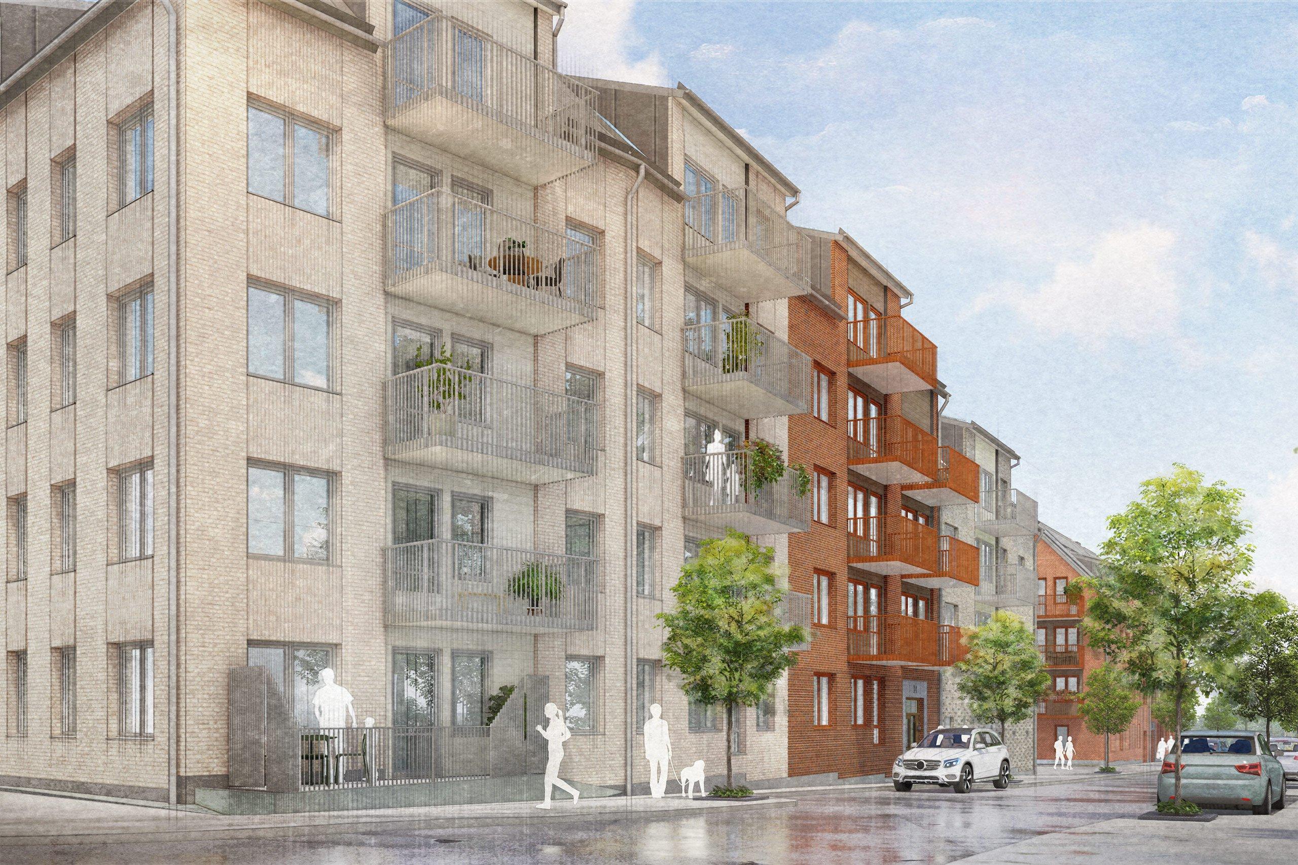 Bostadshus med tegelfasad i olika kulörer.