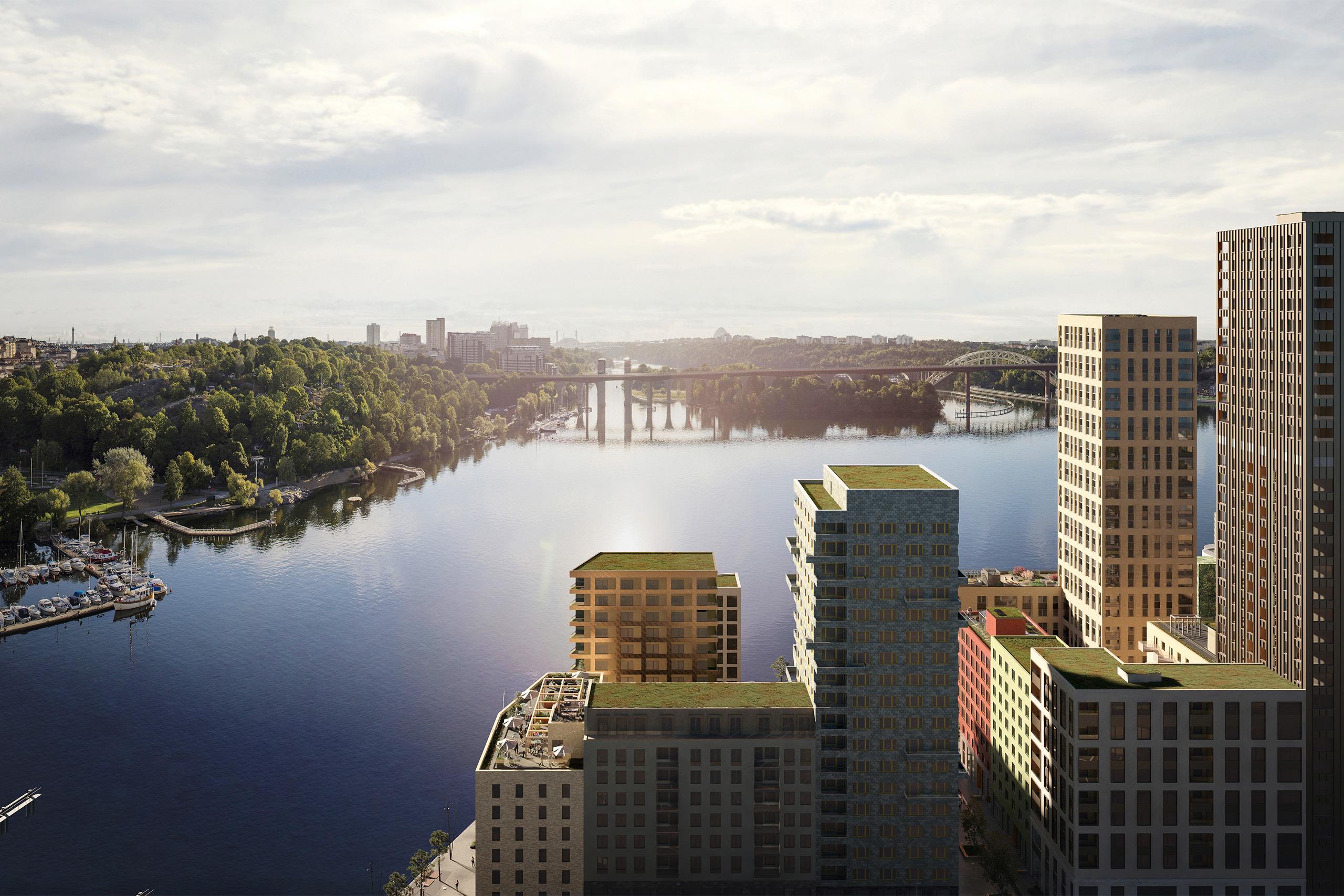 Husfasader med Årstaviken i bakgrunden. 