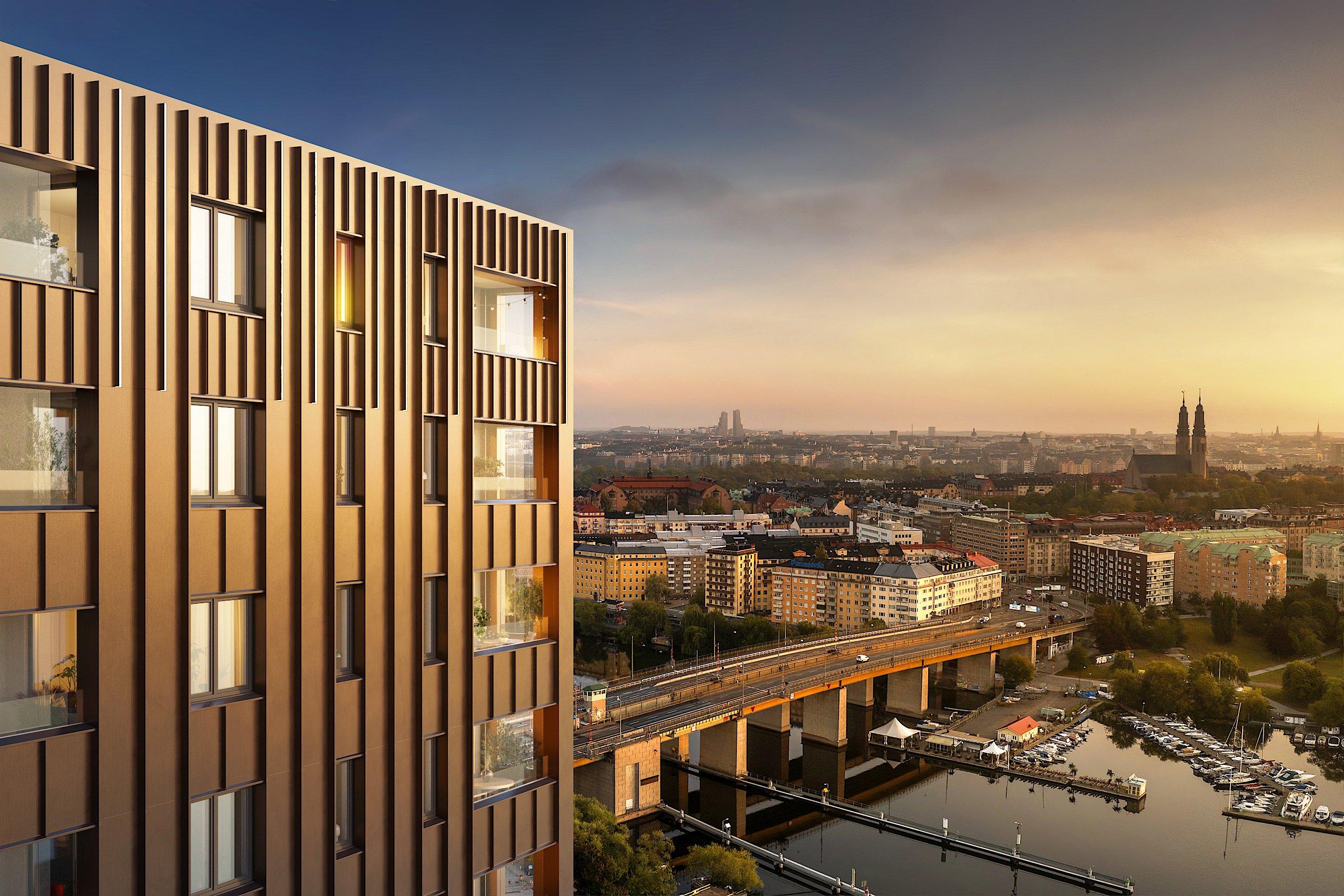 Spirans fasad i soluppgång med Hornstull i bakgrunden 