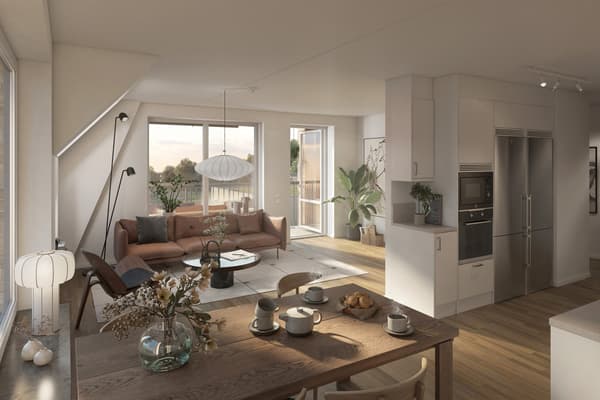 Bostäderna har fina materialval, öppna planlösningar och gott om förvaring (visionsbild från bostad 21601).
