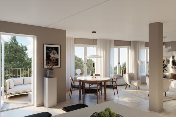 Det välplanerade köket har ett tidlöst uttryck med släta luckor, stenkompositskiva och helintegrerade vitvaror. Köksö är möjligt tillval.