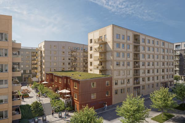 Ljust kvarter med lägenheter och några stadsradhus.