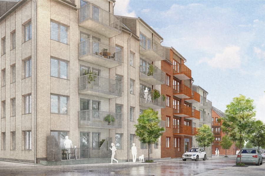 Bostadshus med tegelfasad i olika kulörer.